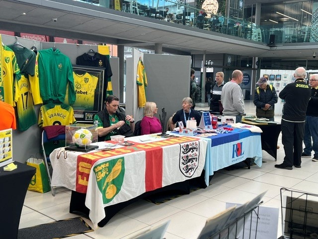 Memorabilia stalls and visitors browsing at the November 2024 Poppy Event, The Forum Norwich
